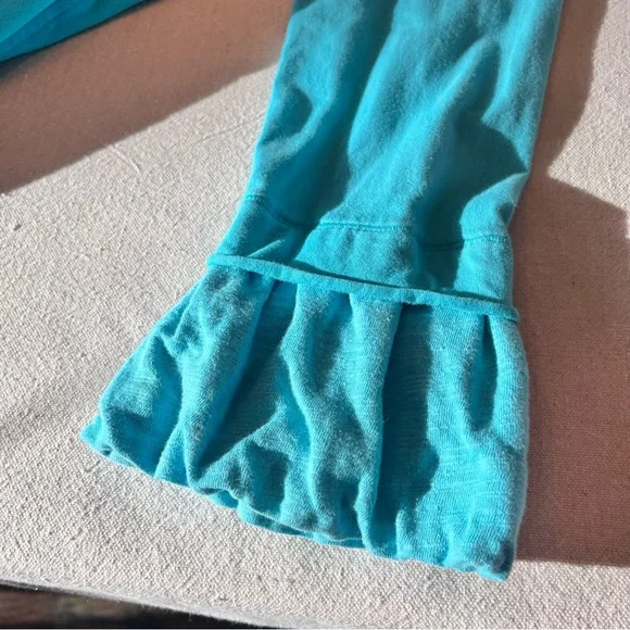 Neon Buddha Blue Sparkly Buttons Tunic
Size Medium - Picture 10 of 13